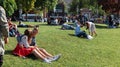 People have a rest on the lawn