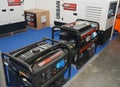 Mobile power backup generators for sale in the market. Portable Generators for Sale Royalty Free Stock Photo