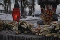 people brought flowers and candles to the monument to the victims of the Holodomor