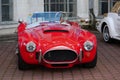 Red retro car Shelby Cobra stands at central Expo Center in Kyiv, Ukraine Royalty Free Stock Photo