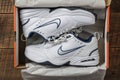 Beautiful new Nike Air Force white mens sneakers in box, close up, top view