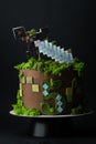 KYIV, UKRAINE - October 22: Birthday cake for a Minecraft video game fanboy decorated with edible green grass and Minecraft