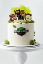 Birthday cake for a Minecraft video game fanboy decorated with transparent caramel candies, edible Royalty Free Stock Photo