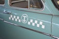 KYIV, UKRAINE - October, 10, 2019:  Close up on USSR vintage 1950s taxi car with taxi sign.  Retro Taxi cab concept Royalty Free Stock Photo