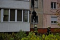 A firefighter climbs an easy staircase to the second floor of a residential building to extinguish the fire.