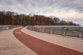 Kyiv, Ukraine - October 18, 2019: Pedestrian and bicycle bridge at sunrise, the construction named Glass Bridge