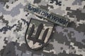 KYIV, UKRAINE - October 6, 2022. Russian invasion in Ukraine 2022. Ukraine Army uniform badges. Text in ukrainian - Armed Forces