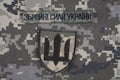 KYIV, UKRAINE - October 6, 2022. Russian invasion in Ukraine 2022. Ukraine Army uniform insignia badges. Text in ukrainian - Armed