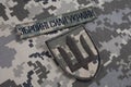 KYIV, UKRAINE - October 6, 2022. Russian invasion in Ukraine 2022. Ukraine Army uniform insignia badges. Text in ukrainian - Armed
