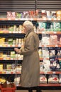 Kyiv, Ukraine - October 29, 2023: Senior old female is shopping at a grocery store or supermarket Varus at Kyiv, Ukraine