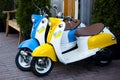 Kyiv, Ukraine - October 16, 2022: Yamaha moped bikes blue yellow Ukrainian flag color. side view