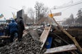 KYIV, UKRAINE: People watch police squad behind th