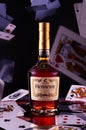 Kyiv, Ukraine - SEP 5, 2020: French Hennessy cognac. Hennessy bottle and playing cards. Royalty Free Stock Photo