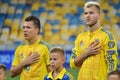 KYIV, UKRAINE - SEPT 5, 2016: Andriy Yarmolenko and Yevgen Konoplyanka listen to the anthem during the FIFA World Cup