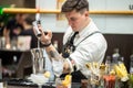 Barman preparing a cocktail on Barometer international bar show