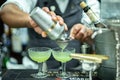 Barmen makes cocktail on Barometer international bar show