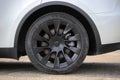 Black rear tire wheel close-up of a car