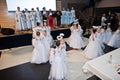 Kyiv, Ukraine - September 1, 2019: Childrens angels in white dresses at Christmas event