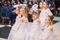 Kyiv, Ukraine - September 1, 2019: Childrens angels in white dresses at Christmas event