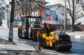 KYIV, UKRAINE - September 10, 2020: Heavy asphalt road roller with heavy vibration roller compactor that press new hot Royalty Free Stock Photo