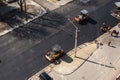 KYIV, UKRAINE - September 10, 2020: Heavy asphalt road roller with heavy vibration roller compactor that press new hot Royalty Free Stock Photo