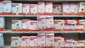 Kyiv, Ukraine - 4 September, 2023: Inside the Auchan supermarket. Showcase with baby diapers