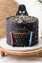 Kyiv, Ukraine - September 09: Star Wars birthday cake with black cream cheese frosting decorated with edible mastic Darth Vader