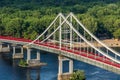 Kyiv. Ukraine. View of the pedestrian bridge over the Dnieper River on a sunny summer day. Royalty Free Stock Photo