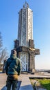 Kyiv - A young man admiring a candle-like tower
