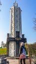 Kyiv - A young woman admiring a candle-like tower