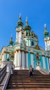 Kyiv - A young woman sitting on the stairs to St Andrew`s Church Royalty Free Stock Photo