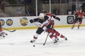 Kyle Palmieri races a Ottawa Senator with the puck.