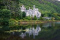 Kylemore Abbey in Ireland with reflections in the Pollacapall Lough Royalty Free Stock Photo