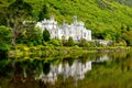 Kylemore Abbey with water reflections in Connemara, County Galway, Ireland, Europe. Benedictine monastery founded 1920 Royalty Free Stock Photo
