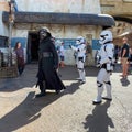 Kylo Ren and two storm troopers walking around the Star Wars  Galaxy`s Edge area of Hollywood Studios Royalty Free Stock Photo