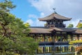 Heian Jingu Garden is a garden with a variety of plants, ponds and buildings and weeping cherry trees Royalty Free Stock Photo