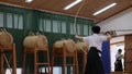 Kyudo practicing bow shooting in Kyoto, Japan. Archery shoot in slowmotion.