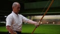 Kyudo practicing bow shooting at night in Kyoto, Japan.