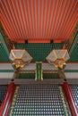 front wide angle view of colorful Amida-do Hall, Hanging golden Hishidoro lamps in Kiyomizu-dera Temple