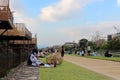 People relaxing in Kamo river. Its riverbanks are popular walking spots for residents and tourists.