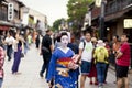 KYOTO,JAPAN- CIRCA MAY, 2016: Maiko geisha walking on a street of Gion in Kyoto Japan Royalty Free Stock Photo