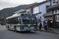 Kyoto city bus pass through Arashiyama stree Royalty Free Stock Photo