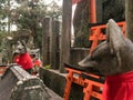 Foxes stone statue at Fushimi Inari Shrine in Japan