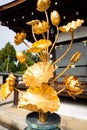 Kyoto, Japan. Golden lotus flowers decoration sculpture in Ninna-ji Temple Complex park in Kyoto, Japan