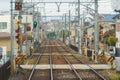 Kyoto, Japan - 01/03/2020 : Japanese railway with a local train run through city. Tourist attraction in travel and transportation