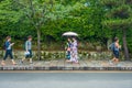 KYOTO, JAPAN - JULY 05, 2017: Unidentified people walking in a path at beatiful bamboo forest at Arashiyama, Kyoto Royalty Free Stock Photo