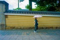 KYOTO, JAPAN - JULY 05, 2017: Unidentified woman holding an umbrella and walking in the city to visit the beautiful view