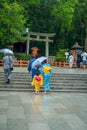 KYOTO, JAPAN - JULY 05, 2017: Young Japanese women wearing traditional Kimono and holding umbrellas in their hands in Royalty Free Stock Photo