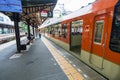Eizan Electric Railway train stops at the Demachiyanagi Station. Kyoto, Japan. Royalty Free Stock Photo