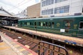 Eizan Electric Railway train stops at the Demachiyanagi Station. Kyoto, Japan. Royalty Free Stock Photo